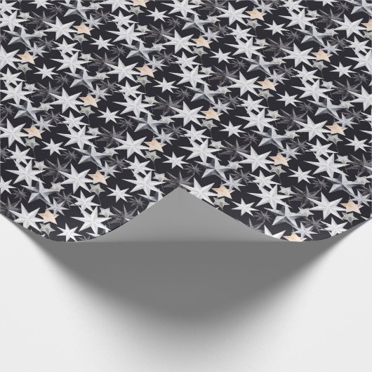 Weiße und beige Sterne. Schwarzer Hintergrund. Chr Geschenkpapier (Ecke)