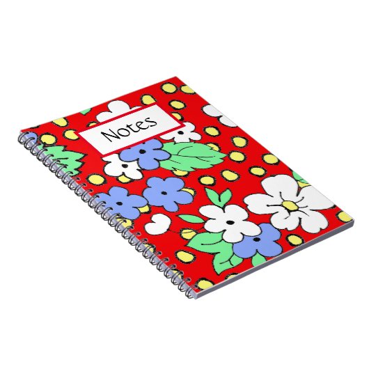 Weiße und blaue Blumen auf einem roten Spiralheft Notizblock (Rechte Seite)