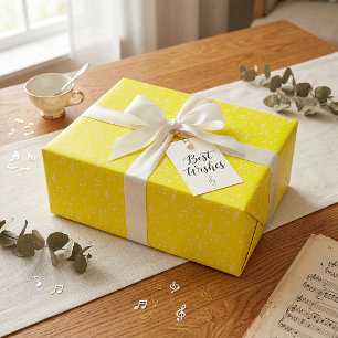 Weiße und gelbe musikalische Geschenkpapier