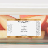 Weiße und goldfarbene Flasche mit wasserfester Kos Etiketten (Befestigt)