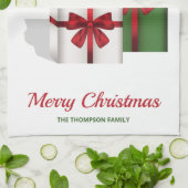 Weiße und grüne Geschenkboxen mit Weihnachtsmannmü Geschirrtuch (Gefaltet)