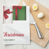 Weiße und grüne Geschenkboxen mit Weihnachtsmannmü Geschirrtuch (Viertel Falte)