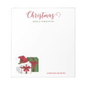 Weiße und grüne Geschenkboxen mit Weihnachtsmannmü Notizblock (Vorderseite)