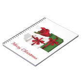 Weiße und grüne Geschenkboxen mit Weihnachtsmannmü Notizblock (Linke Seite)
