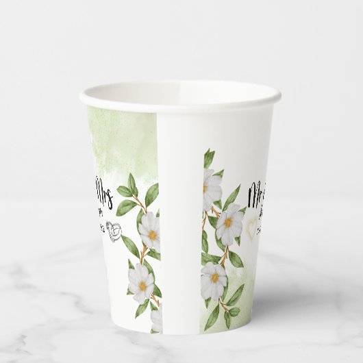 Weiße und grüne Wasserfarbe Pappbecher (Links)