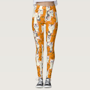 Weiße und Ingwer Katzen Muster grüne Augen blaue A Leggings