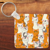 Weiße und Ingwer Katzen Muster grüne Augen blaue A Schlüsselanhänger (Vorderseite)