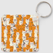 Weiße und Ingwer Katzen Muster grüne Augen blaue A Schlüsselanhänger (Rückseite)