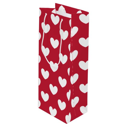 Weiße und rote Polka-Herzen Geschenktüte Für Weinflaschen (Vorderseite Schrägansicht)
