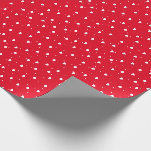 Weiße Valentine hören Muster über Rot Geschenkpapier (Ecke)