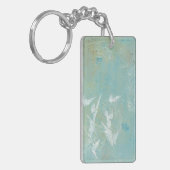 Weiße Vögel fliegen durch den blauen Himmel Schlüsselanhänger (Vorderseite links)