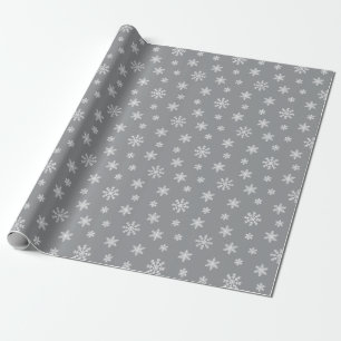 Weiße Weihnachts-Schneeflocken auf grauem Hintergr Geschenkpapier