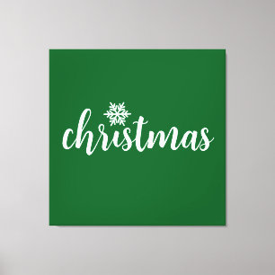 Weiße Weihnachts-Schrift-Schneeflocke auf Waldgrün Leinwanddruck