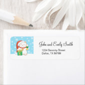 Weiße Weihnachtskatze in einem Red Hat (Insitu)