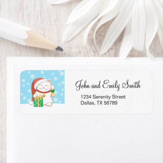 Weiße Weihnachtskatze in einem Red Hat (Insitu)