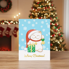 Weiße Weihnachtskatze in einem Red Hat Folien Feiertagspostkarte