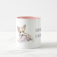 Weißer Creme-Welpe mit rosa Schuh