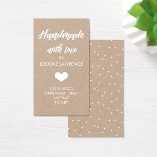 Weißer Herzgriff mit Liebe-Kraft-Papier