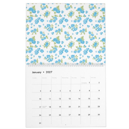 weißer Hintergrund mit blauen Blumen und grünem Le Kalender (Jan 2027)