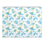 weißer Hintergrund mit blauen Blumen und grünem Le Kalender (Titelbild)