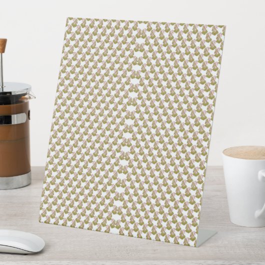 weißer Hintergrund mit grünen Blätter Sockelschild (In Situ)
