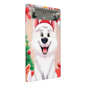Weißer Hund in Weihnachtsmannmütze Mini Klemmbrett (Schrägansicht)