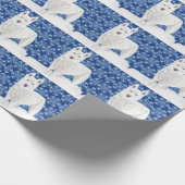Weißer Husky gegen Schneeflocken und dunkelblauer  Geschenkpapier (Ecke)