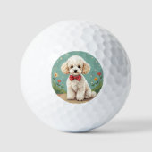 Weißer niedlicher Pudel mit Fliege Golfball (Vorderseite)