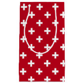 Weißer Polka kreuzt auf rot Kleine Geschenktüte (Vorderseite)