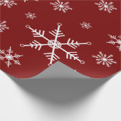 Weißer Schneeflocken auf rotem Muster Geschenkpapier (Ecke)