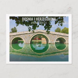 Weißer Schwan unter der Bogenbrücke Postkarte