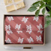 Weißer Totenkopf mit gekreuzter Knochen auf roten Seidenpapier (Geschenk)