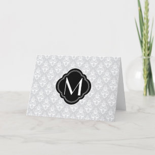 Weißer und grauer Damast mit Monogramm