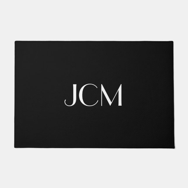Weißes Anfangsmonogramm auf schwarz Fußmatte (Vorderseite)