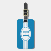 Weißes Band und ovales Schild mit Monogramm auf bl Gepäckanhänger (Vorderseite vertikal)