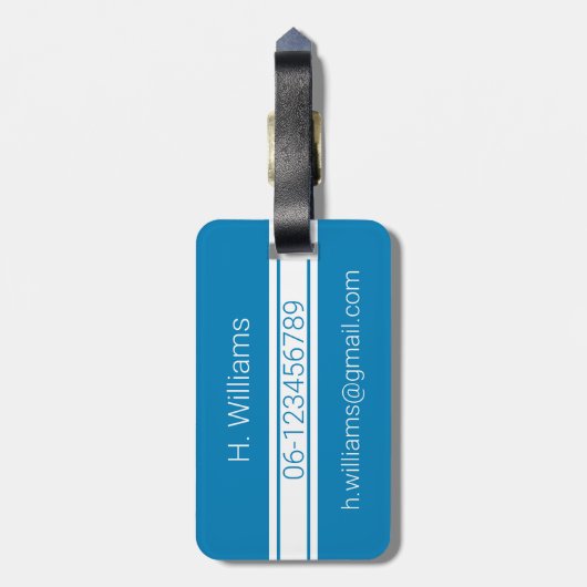 Weißes Band und ovales Schild mit Monogramm auf bl Gepäckanhänger (Rückseite vertikal)