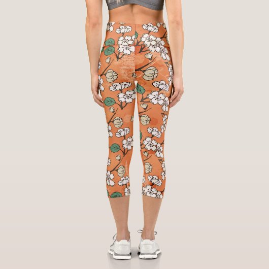 Weißes Blumendesign Orange Capri Leggings (Rückseite)