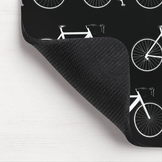 Weißes Fahrrad auf schwarz Mousepad (Ecke)