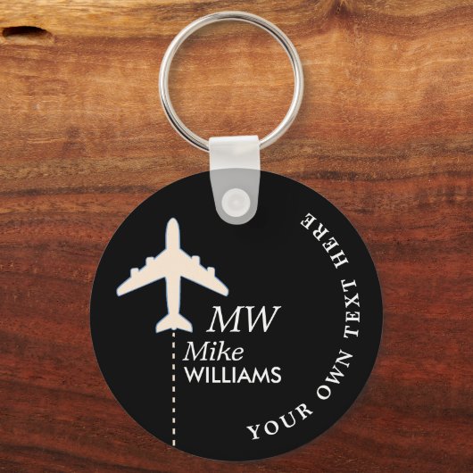 Weißes Flugzeug auf schwarzem Schlüsselanhänger mi (Vorderseite)
