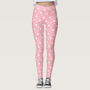 Weißes Herzmuster auf rosa Leggings