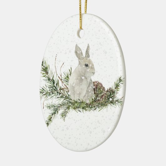 Weißes Kaninchen auf einem Schneeabend Keramik Ornament (Links)