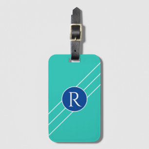Weißes Monogramm in blauem Kreis, Diagonallinien Gepäckanhänger