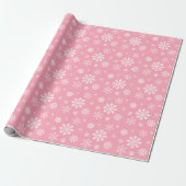 Weißes Schneeflockenmuster auf rosa Hintergrundfar Geschenkpapier (Ungerollt)
