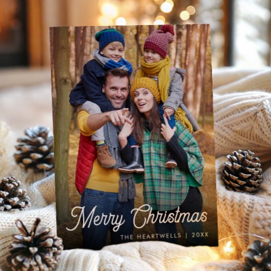 Weißes Skript Frohe Weihnachten Vertikales Foto