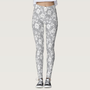 Weißes Spitzemuster auf grauem Hintergrund Leggings