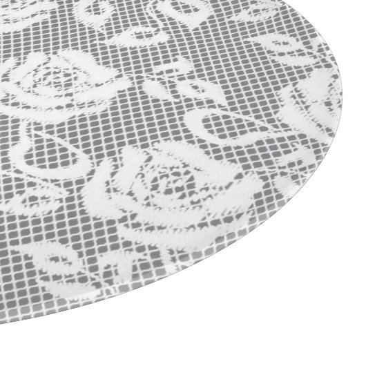 Weißes Spitzemuster auf grauem Hintergrund Schneidebrett (Ecke)