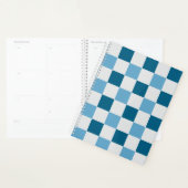 Weißes und blaues Karton Planer (Anzeige)