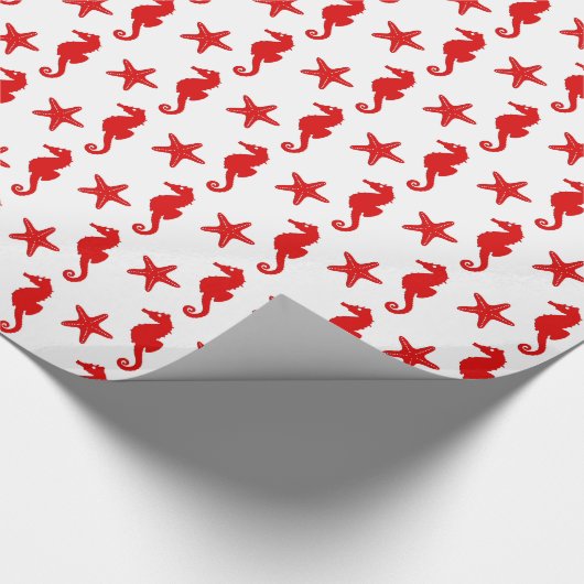 Weißes und dunkles korallenrotes Rot des Seepferds Geschenkpapier (Ecke)