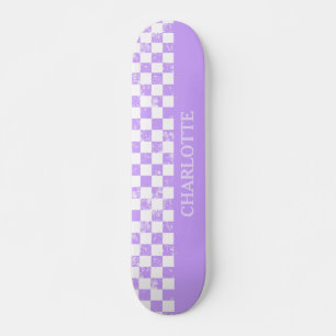 Weißes und Lilac-Scheckrockner Skateboard