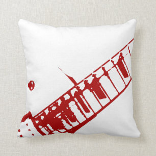 weißes und rotes Instrument der Kissen